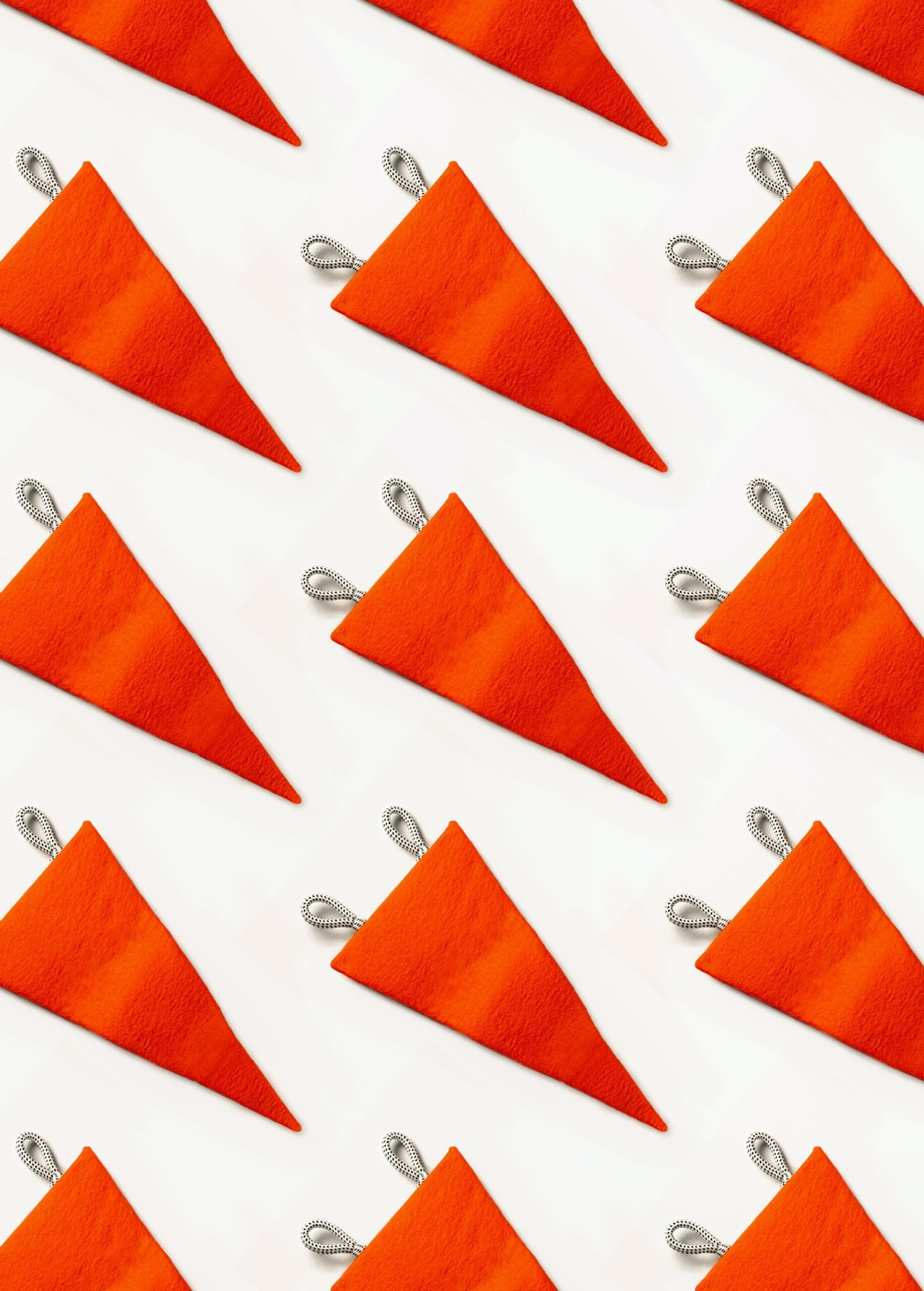 a close up of a bunch of orange triangles