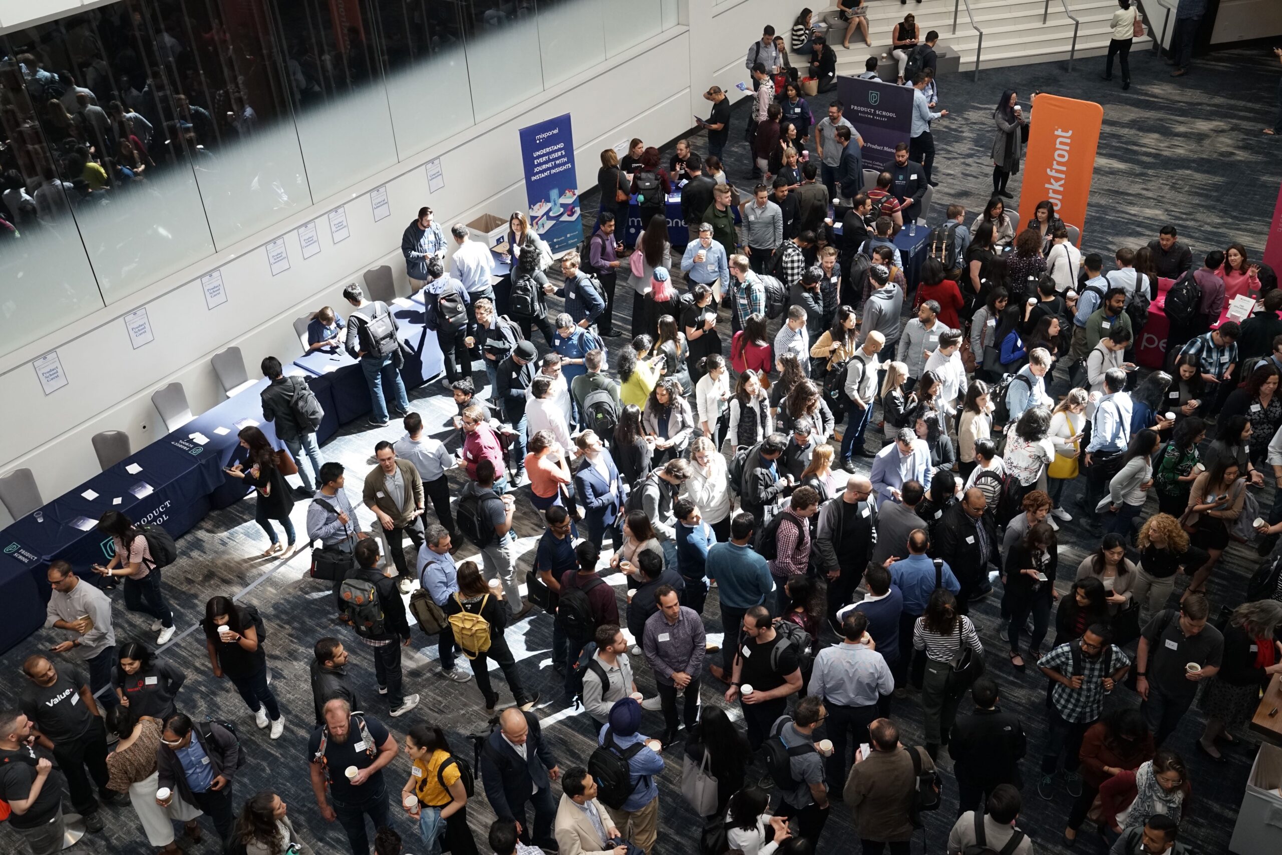 crowd of people in building lobby